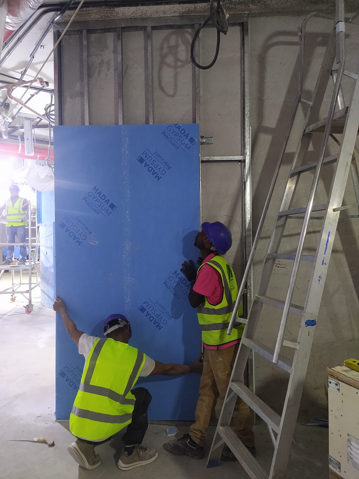SAB Seasons gypsum ceiling Dubai — multi-tier bulkhead installation