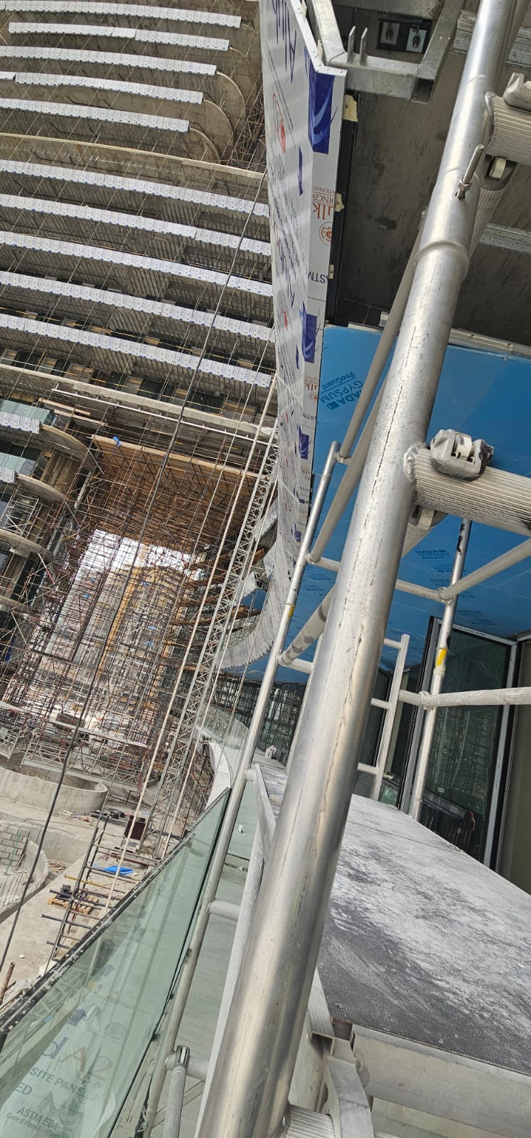 SAB Seasons false ceiling Dubai — metal grid and MEP coordination on site